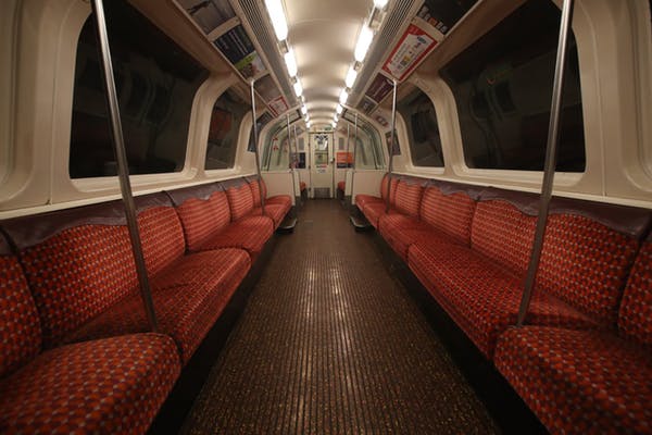 Empty seats on the Glasgow Subway, March 2020. Andrew Milligan/PA